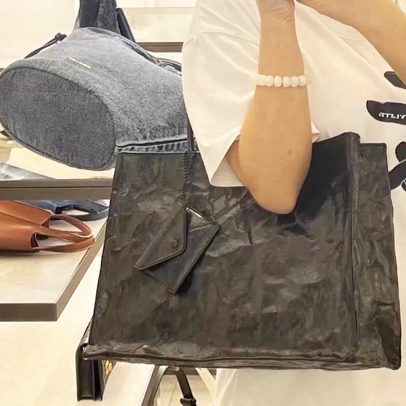 أكياس محفورة على ورق كرافت الك - مراجعة Luxury Bags Made وسعره